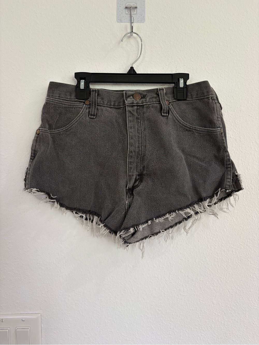 Wrangler black denim shorts with a cut-off hem